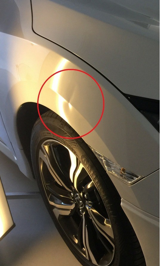 Before repair - dented panel